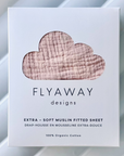 Box of Flyaway Designs extra-soft muslin fitted sheet on a light background