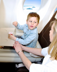 Child eating while sitting on Flyaway Kids Bed