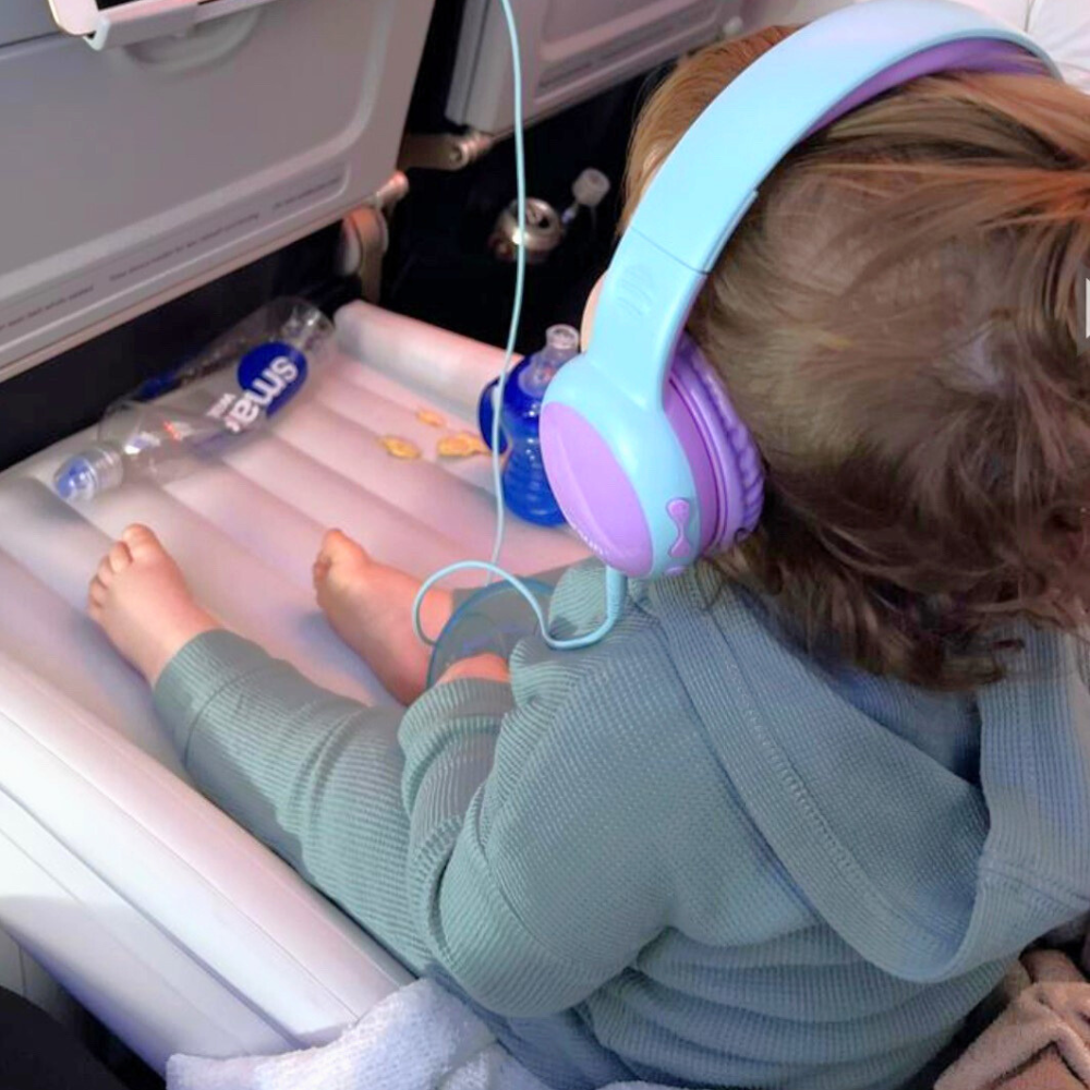 Child sitting on Flyaway Kids Bed