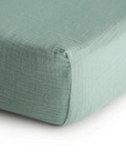 Corner of green fitted sheet