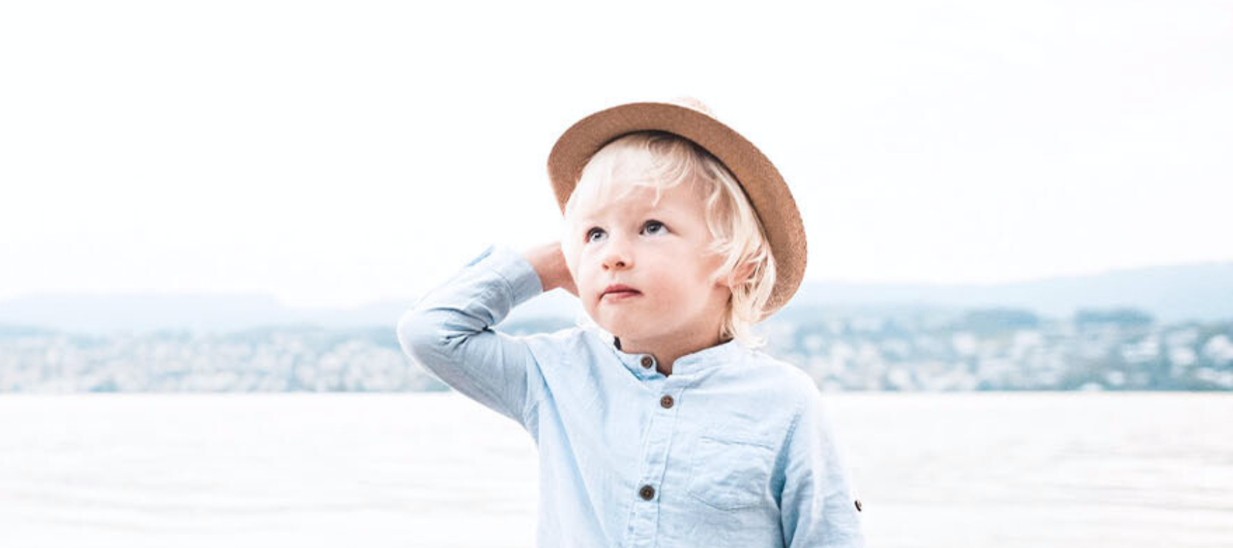 child looking at sky