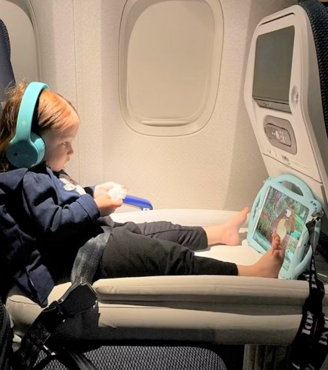 child on flyaway kids bed