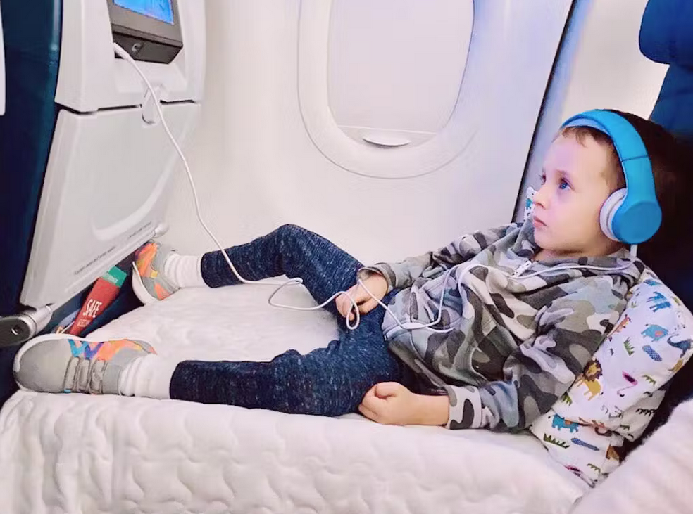 child on flyaway kids bed