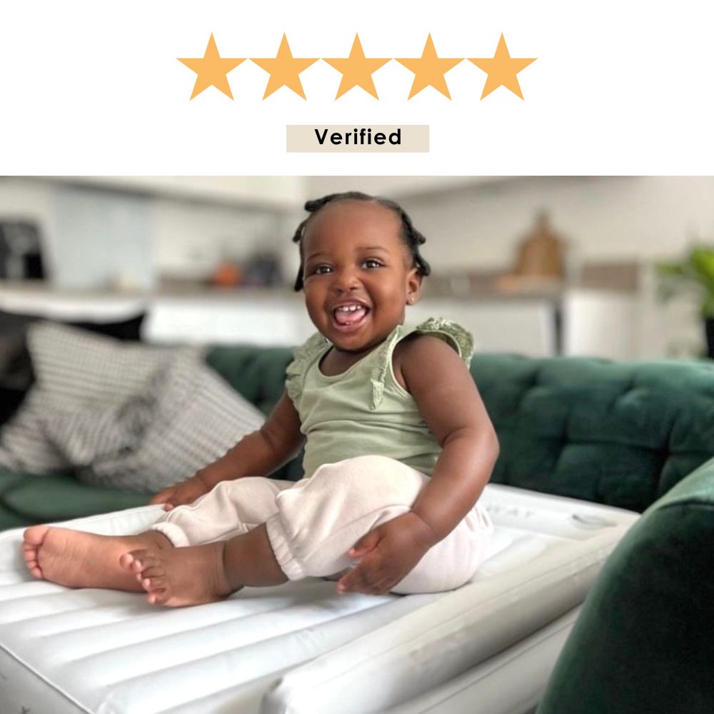 Child sitting on Flyaway Kids Bed