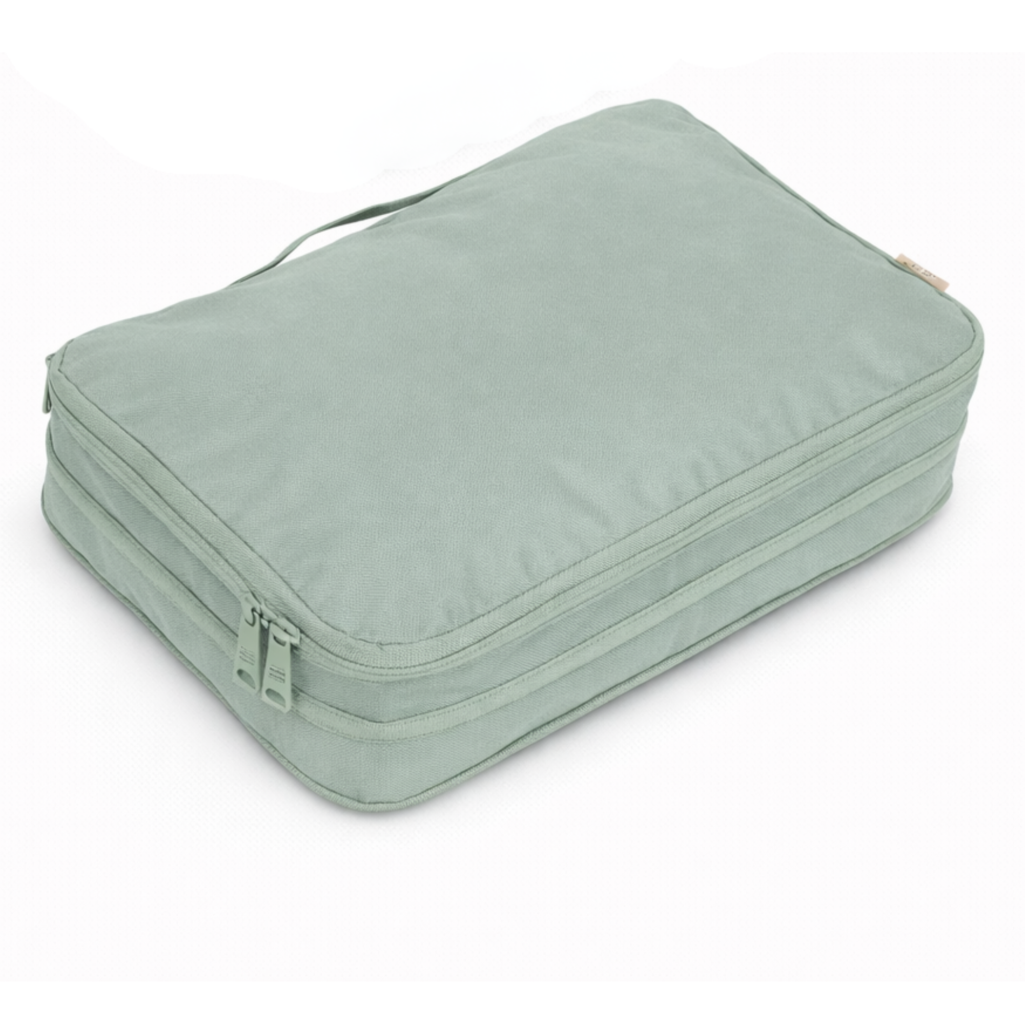 Light green travel packing cube on a white background