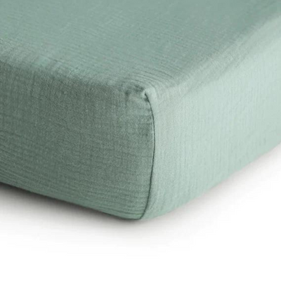 Corner of green fitted sheet