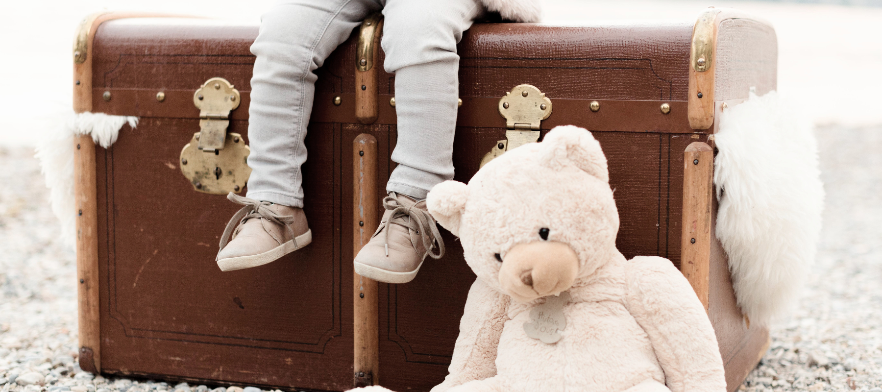 Child on suitcase